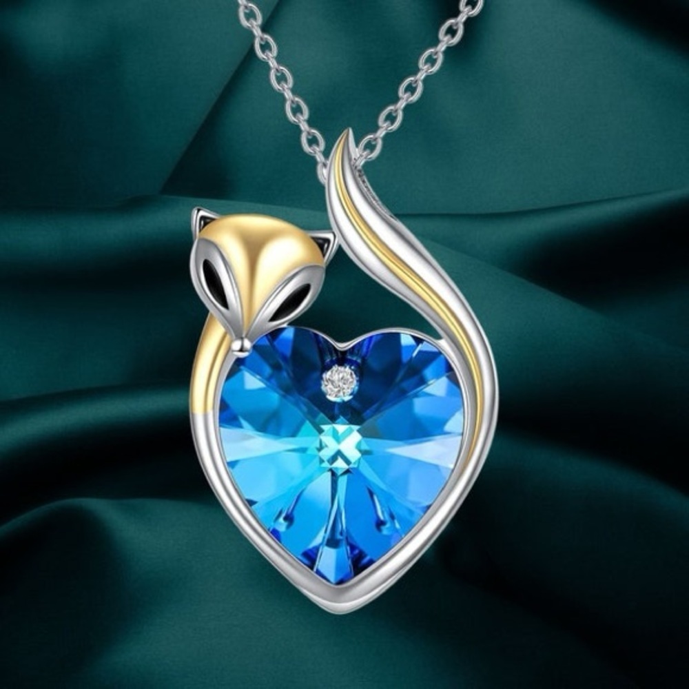 Blue Heart Pendant Necklace with Gold Accents